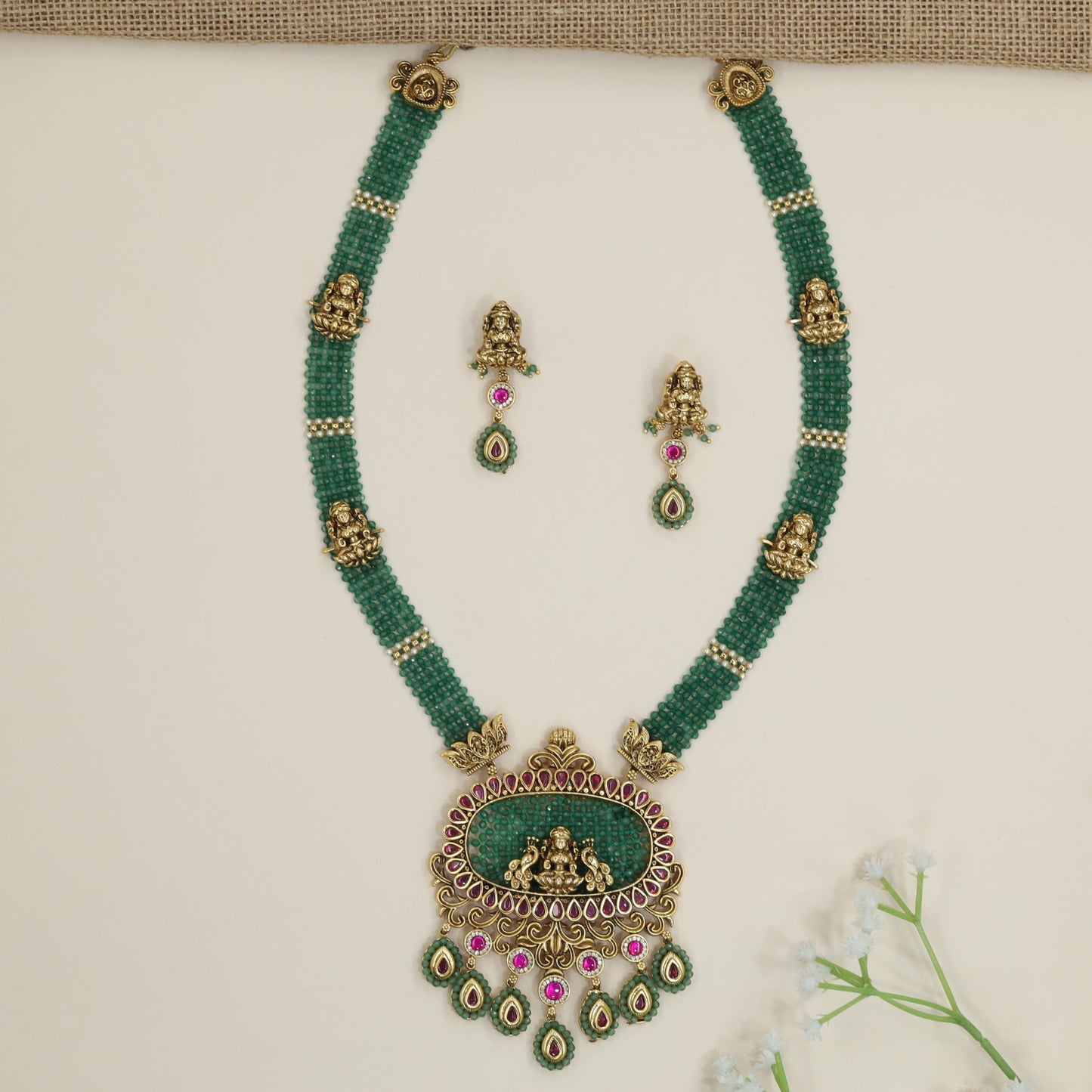 Peacock motif necklace with sculpted Lakshmi pendant centrepiece