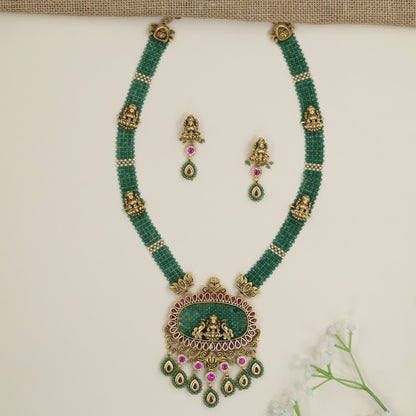 Peacock motif necklace with sculpted Lakshmi pendant centrepiece