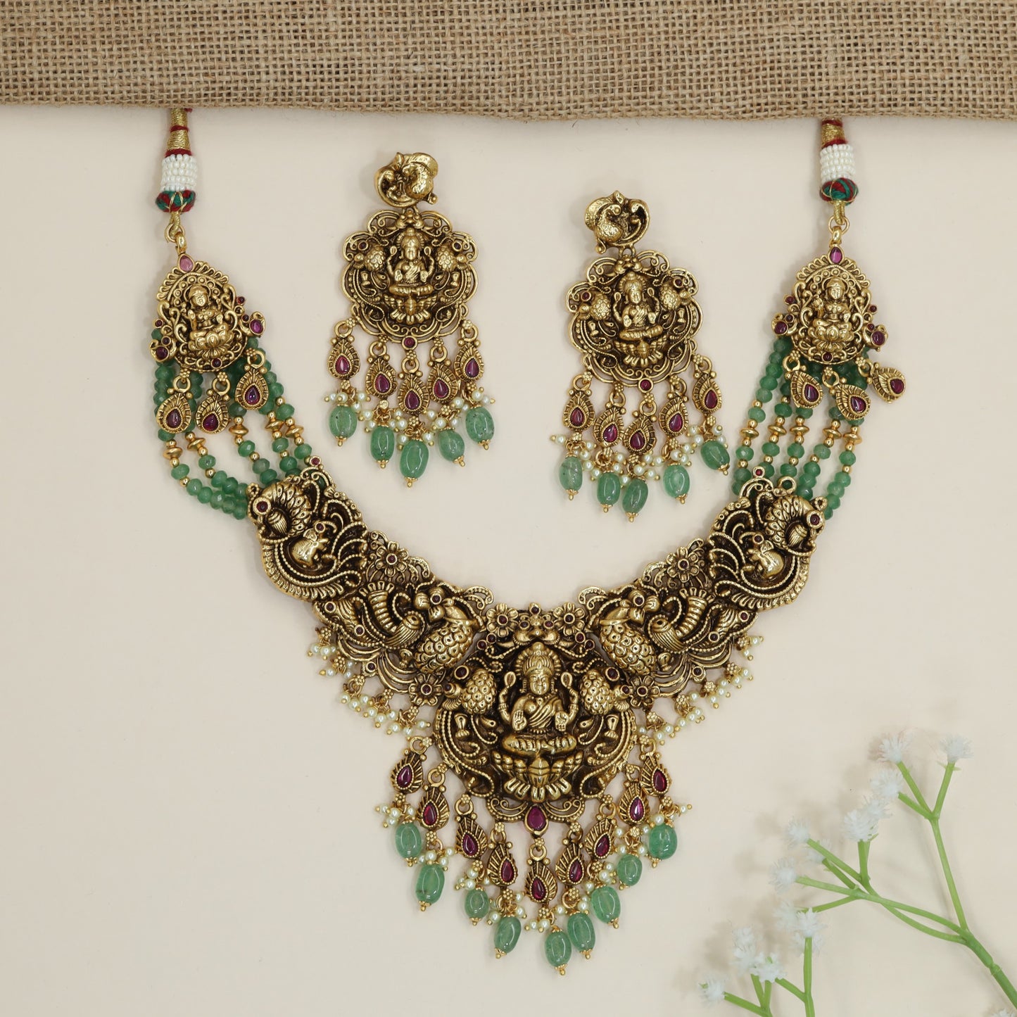 Lakshmi pendant beads necklace with twin peacock motif detailing