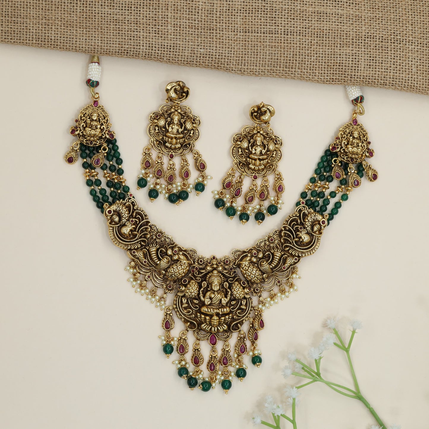 Lakshmi pendant beads necklace with twin peacock motif detailing