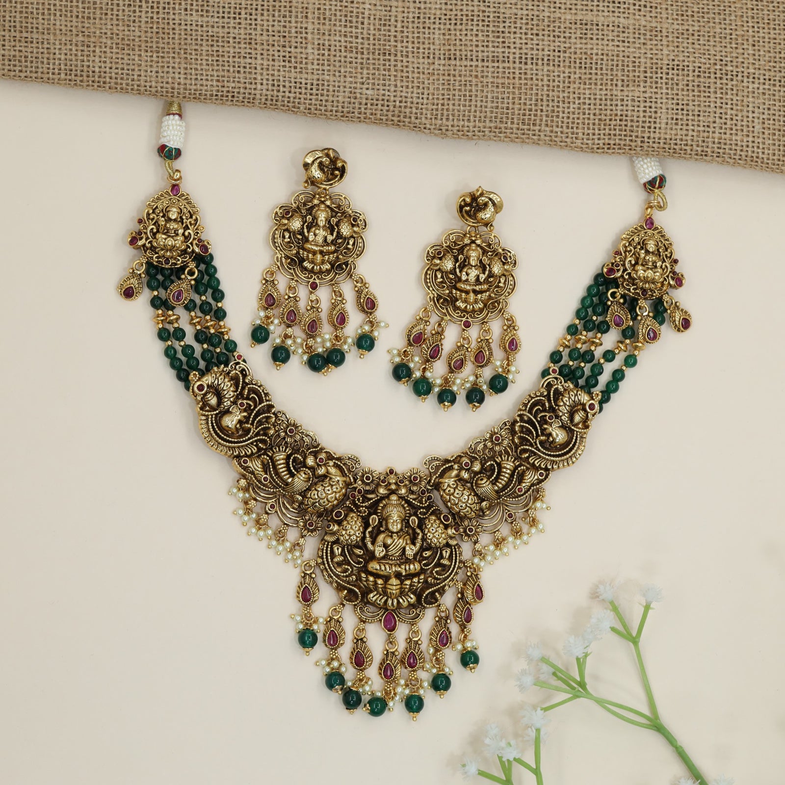 Lakshmi pendant beads necklace with twin peacock motif detailing