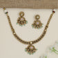 Traditional flower pendant necklace with ornate border detailing