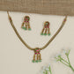 Parrot motif necklace with braided chain silhouette and dangling accents