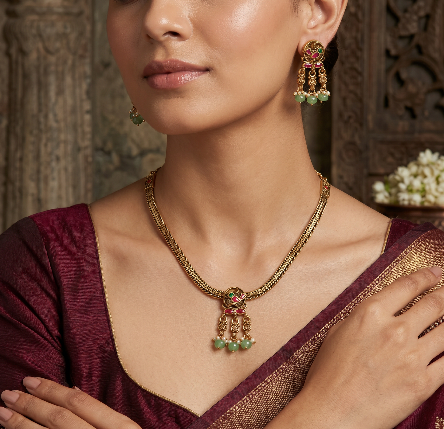 Parrot motif necklace with braided chain silhouette and dangling accents