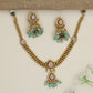 Architectural necklace with layered link construction and pendant drop