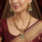 Architectural necklace with layered link construction and pendant drop