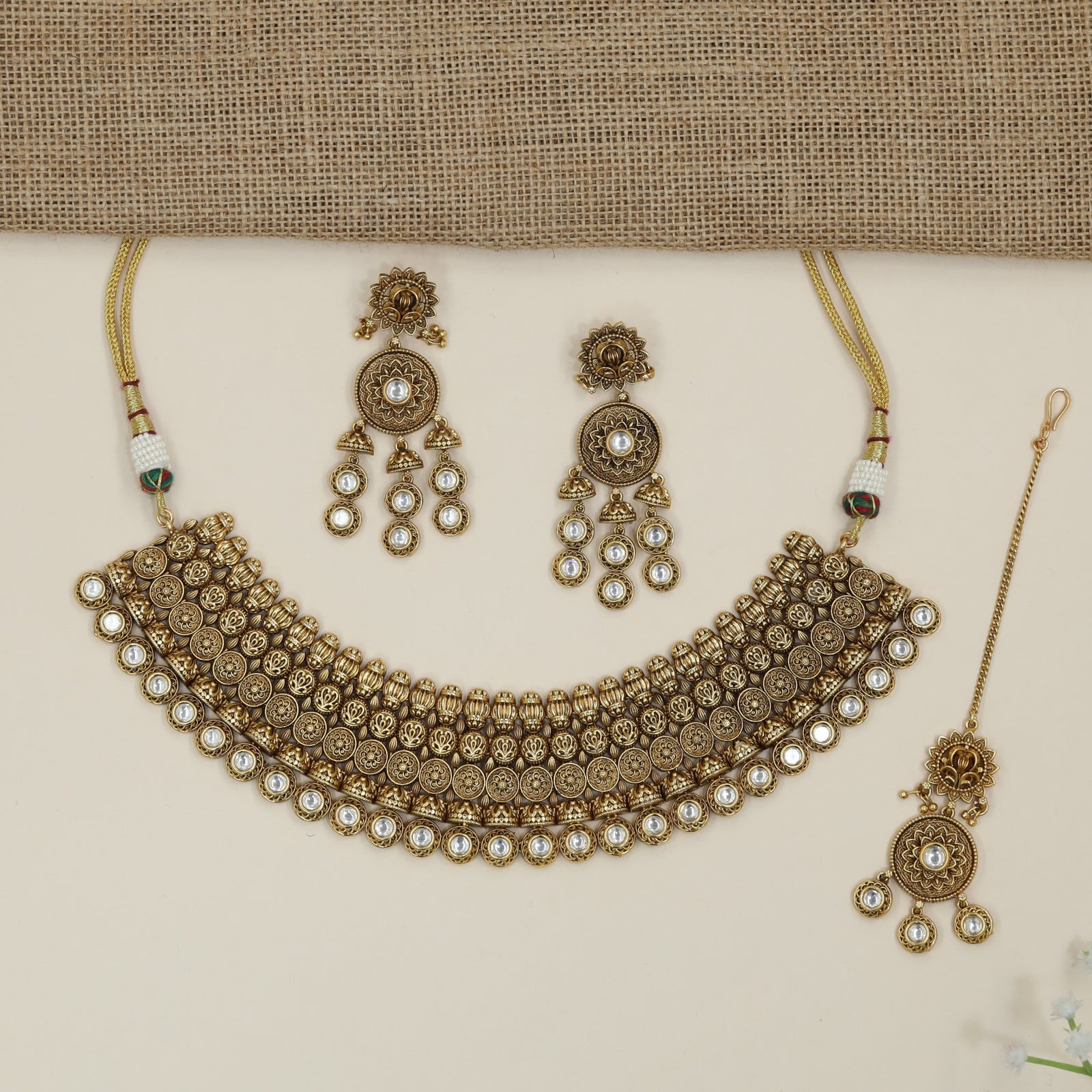 Designer devotional coin choker with layered ornamental borders
