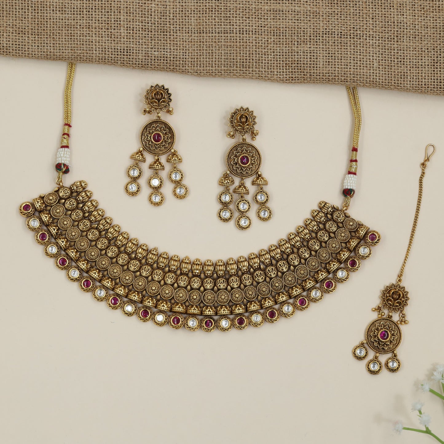 Designer devotional coin choker with layered ornamental borders