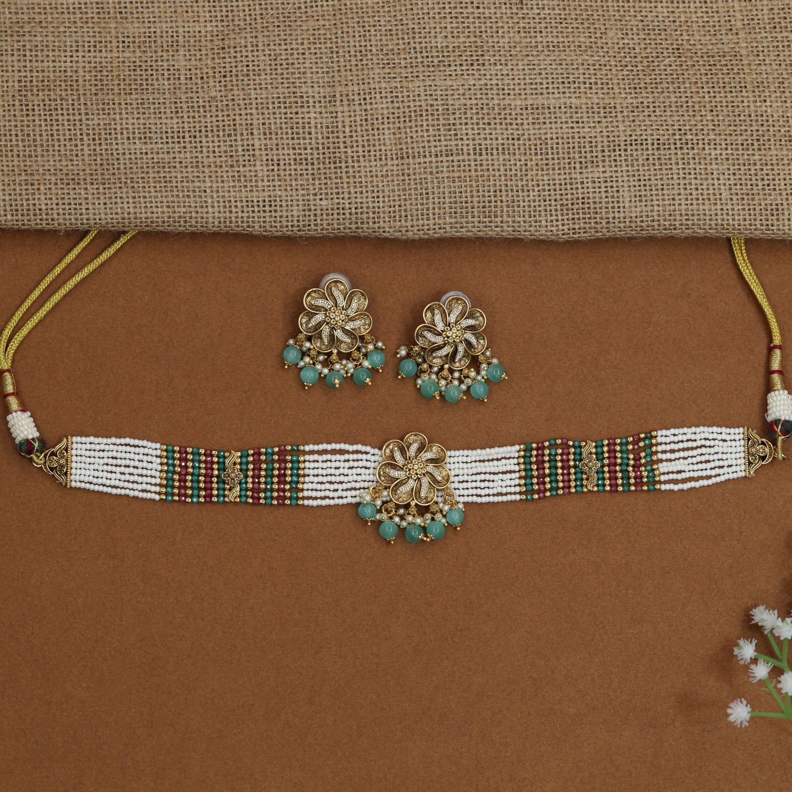 Signature rosette beads choker with ornamental floral craftsmanship