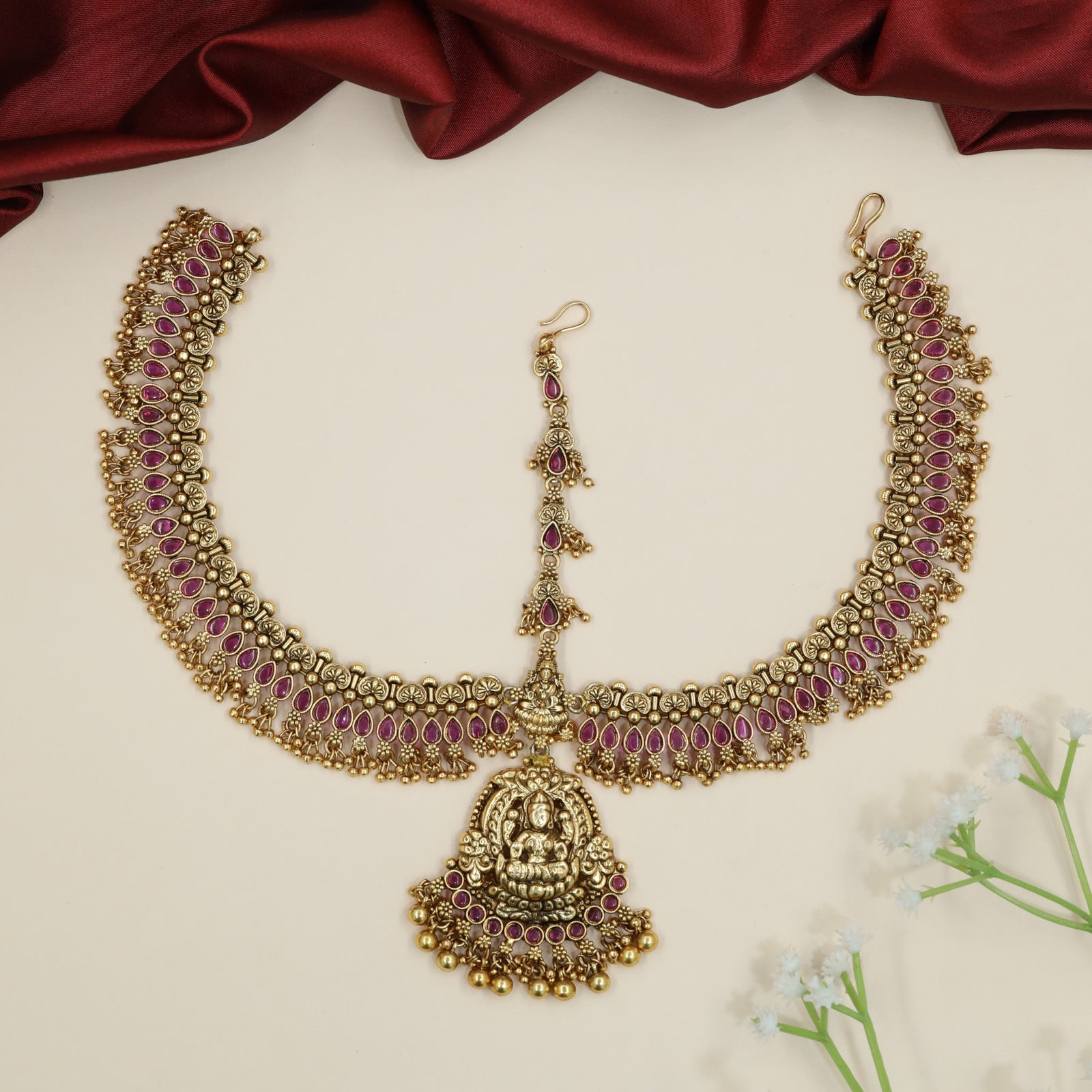 Bridal lakshmi motif matha patti with dangling cluster drops