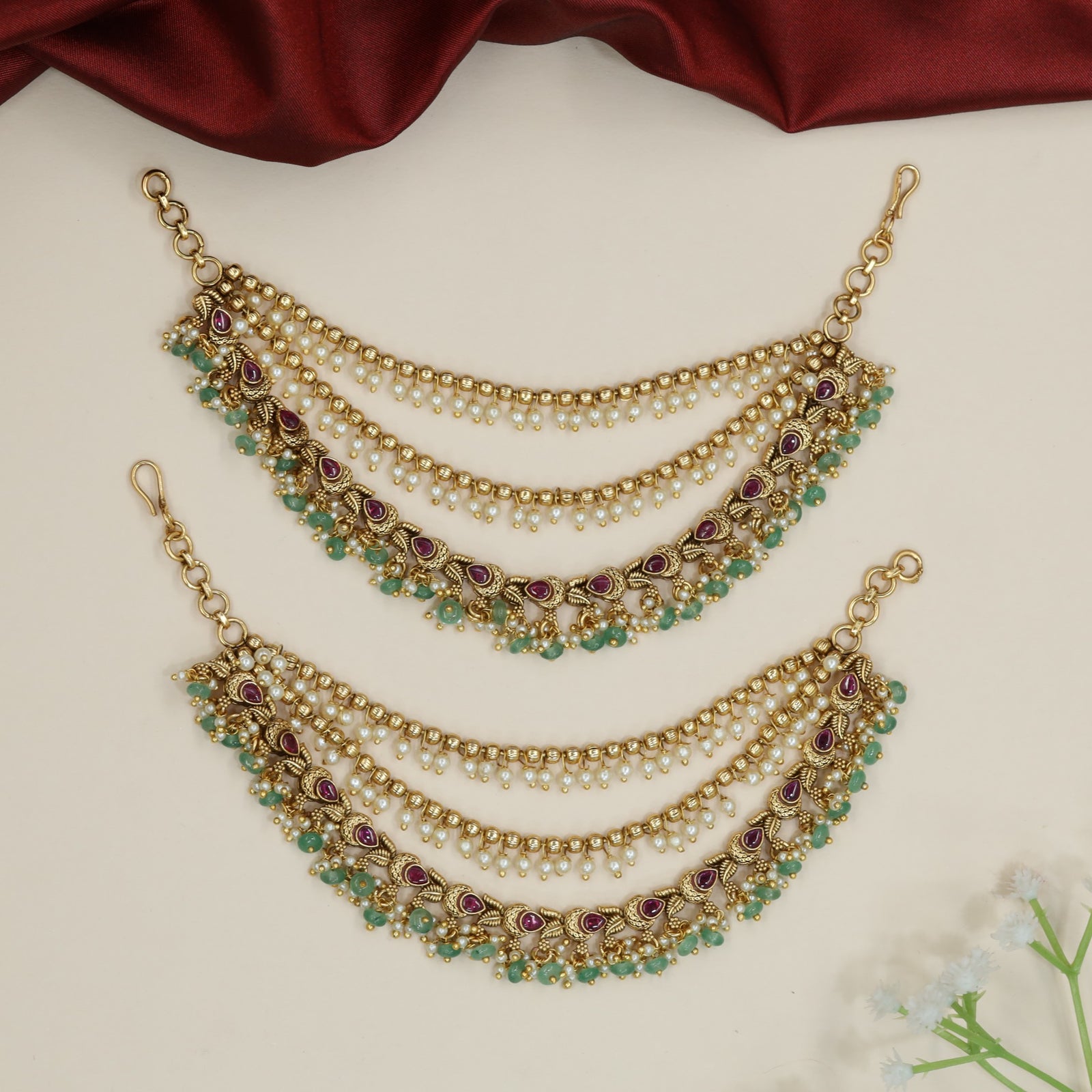 Classic Antique Mati with elegant cascading chain arrangement