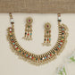 Artisan teardrop necklace with richly textured ornamental design