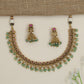 Heirloom crescent pattern necklace with cascading decorative drops