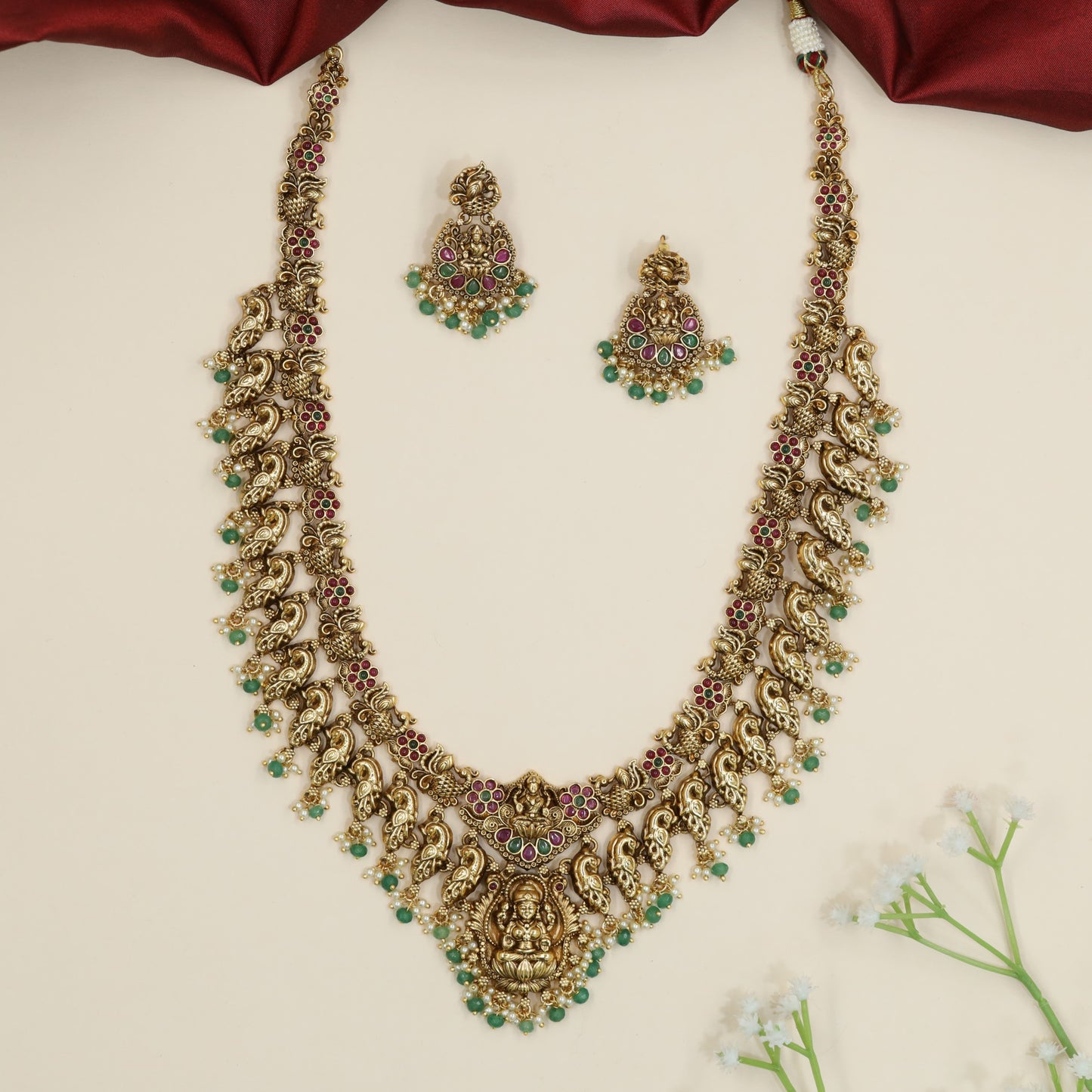 Antique Long Haara with peacock pattern and Lakshmi centrepiece
