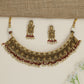 Festive floral necklace with layered motif arrangement and fringe detailing