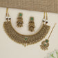 Grand heritage collar necklace with repeating floral coin motifs