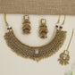 Grand heritage collar necklace with repeating floral coin motifs