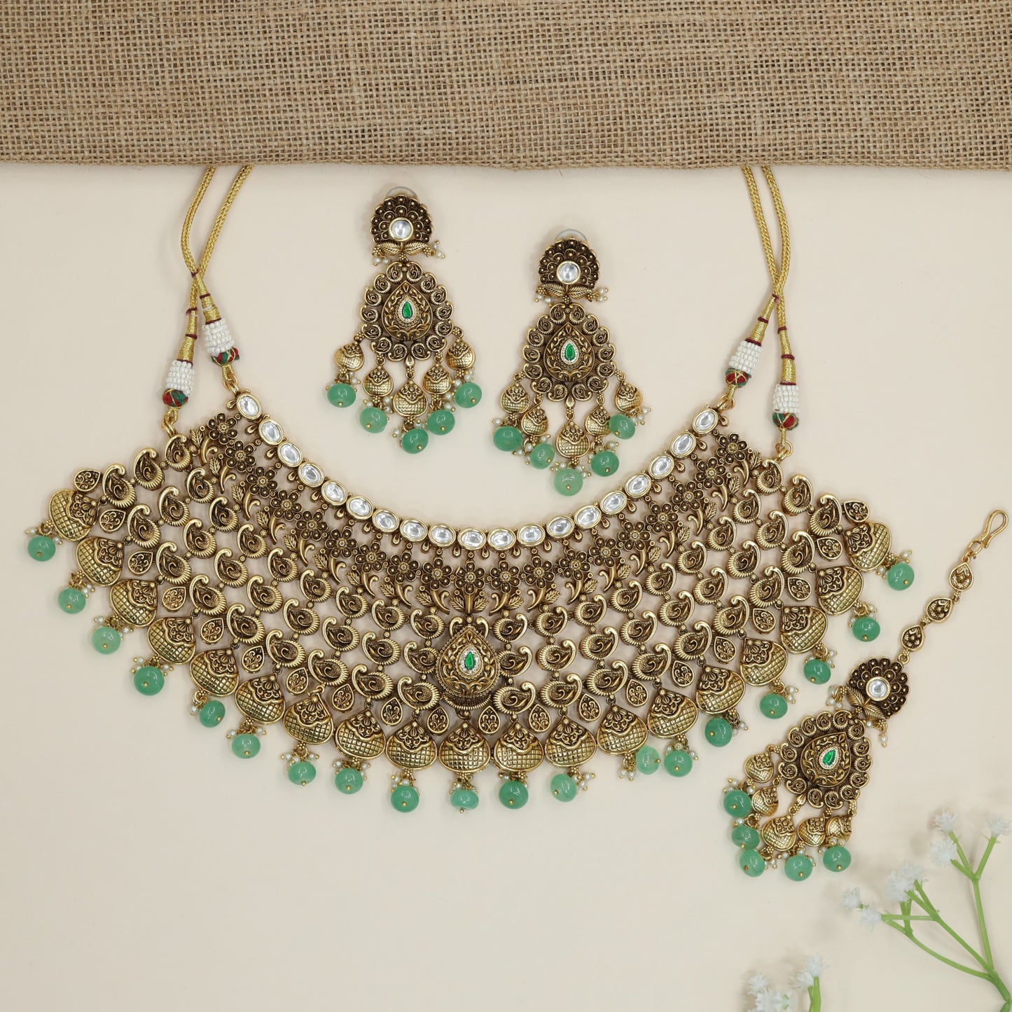 Festive paisley collar choker with ornate medallion detailing
