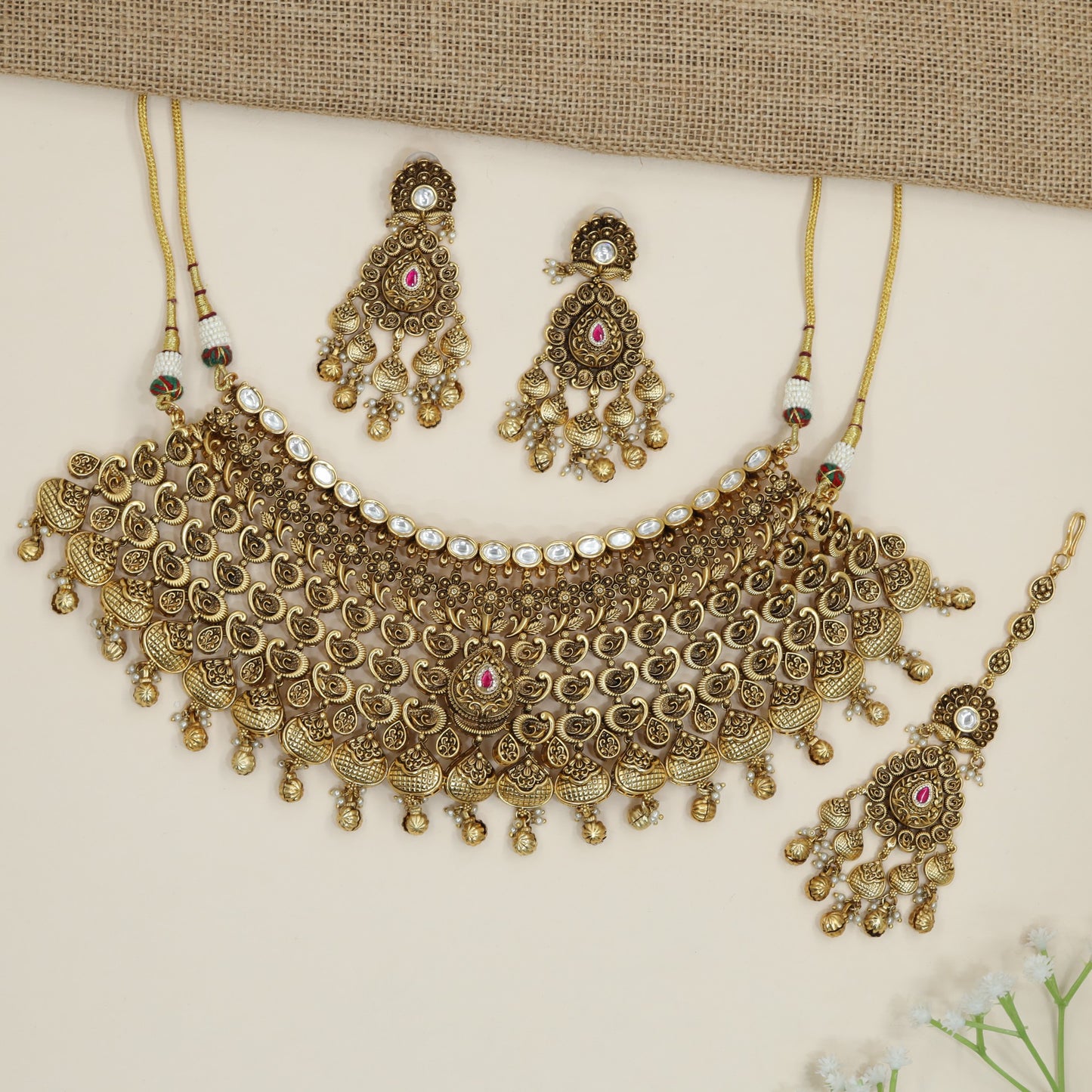 Festive paisley collar choker with ornate medallion detailing