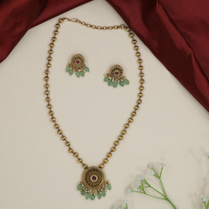 Antique Chain With Pendant featuring floral medallion and hanging accents