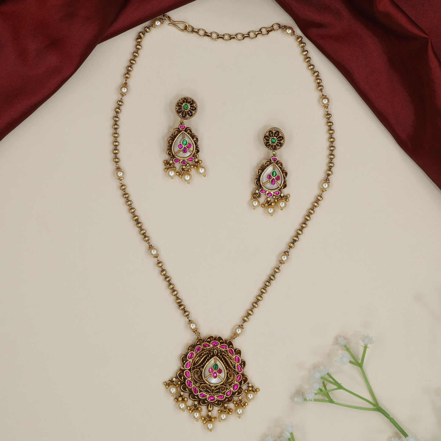 Decorative lotus motif Antique Chain With Pendant with hanging pearl accents