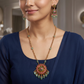 Decorative lotus motif Antique Chain With Pendant with hanging pearl accents
