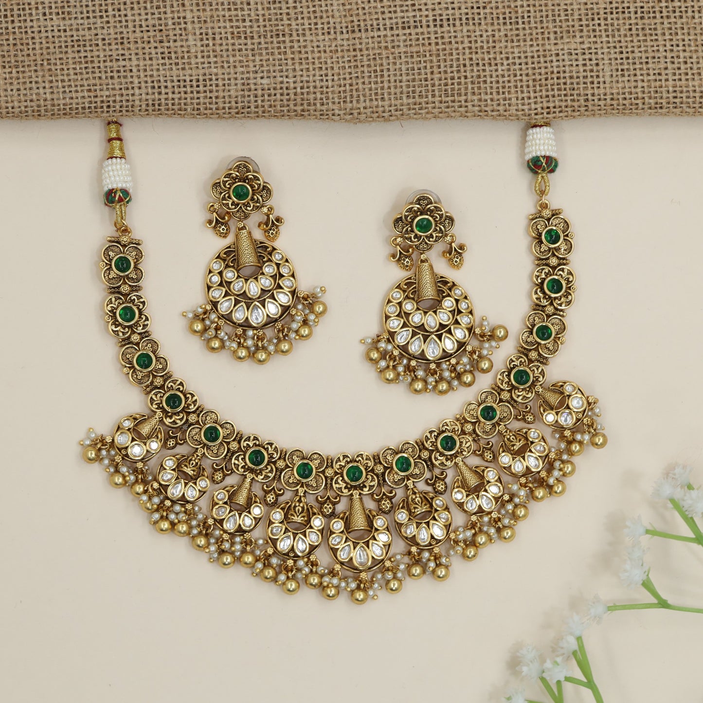 Temple-inspired floral necklace with cascading chandbali accents