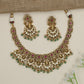 Temple-inspired floral necklace with cascading chandbali accents