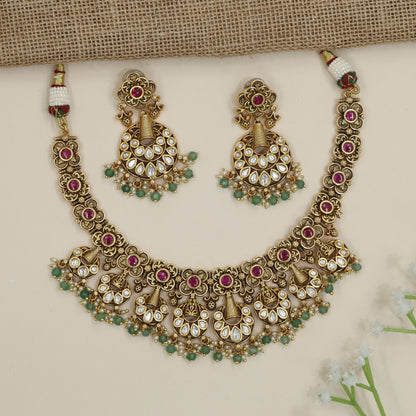 Temple-inspired floral necklace with cascading chandbali accents