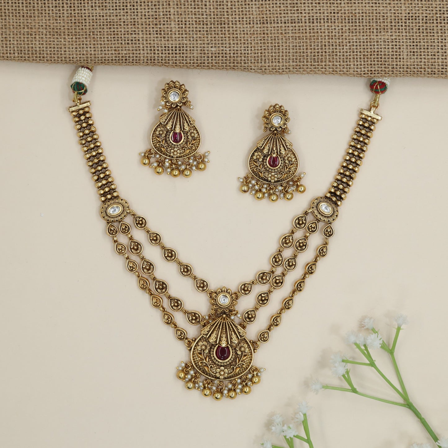 Heritage layered necklace with decorative medallion link detailing