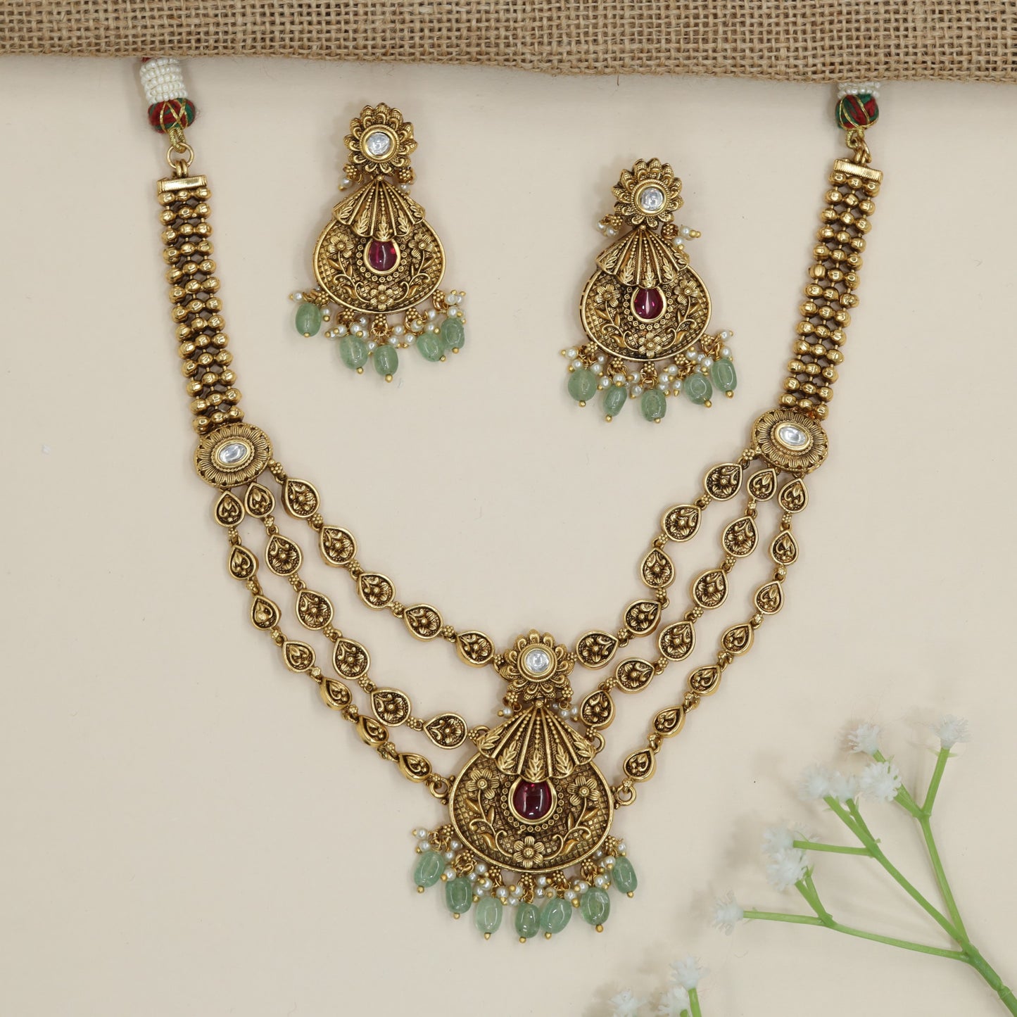 Heritage layered necklace with decorative medallion link detailing