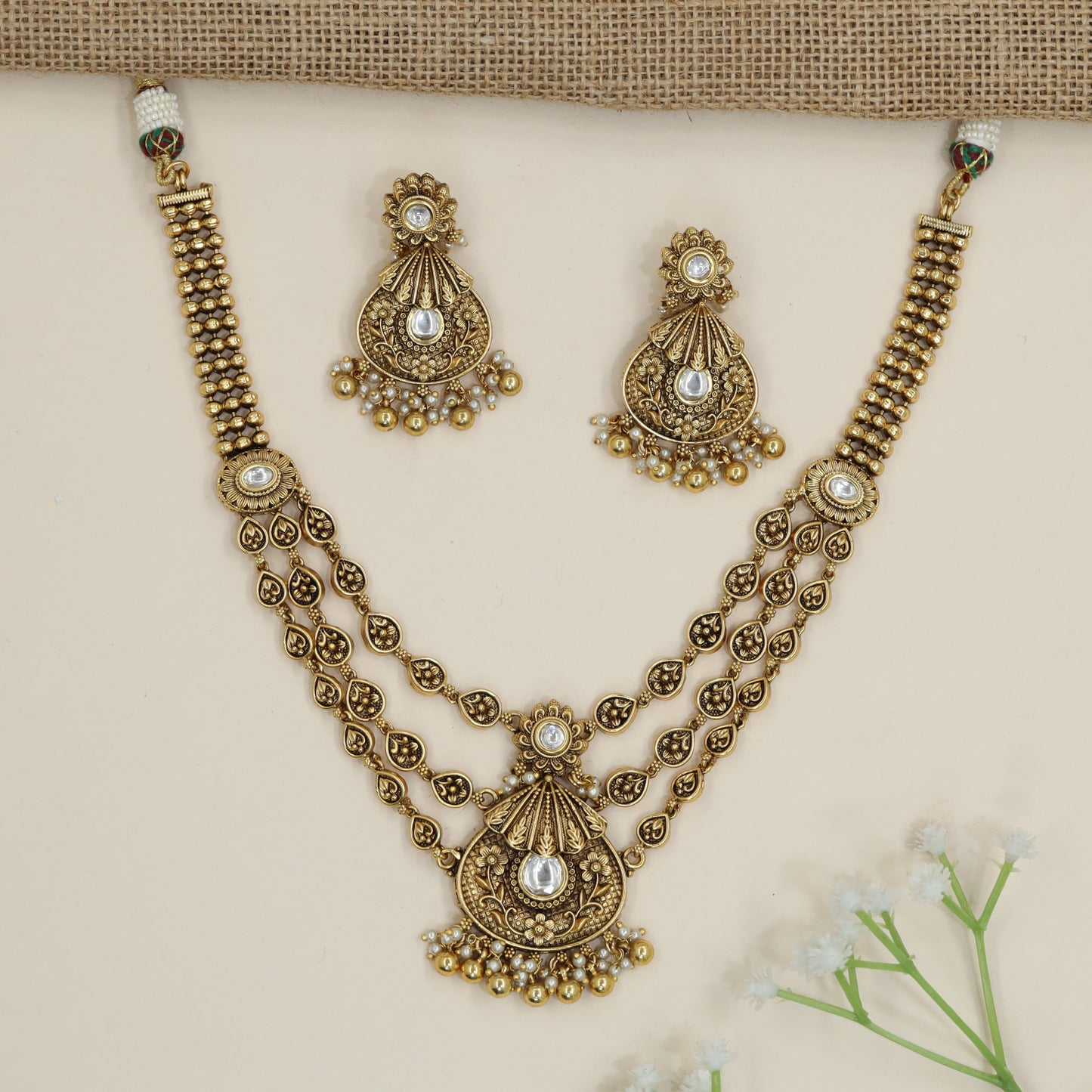 Heritage layered necklace with decorative medallion link detailing