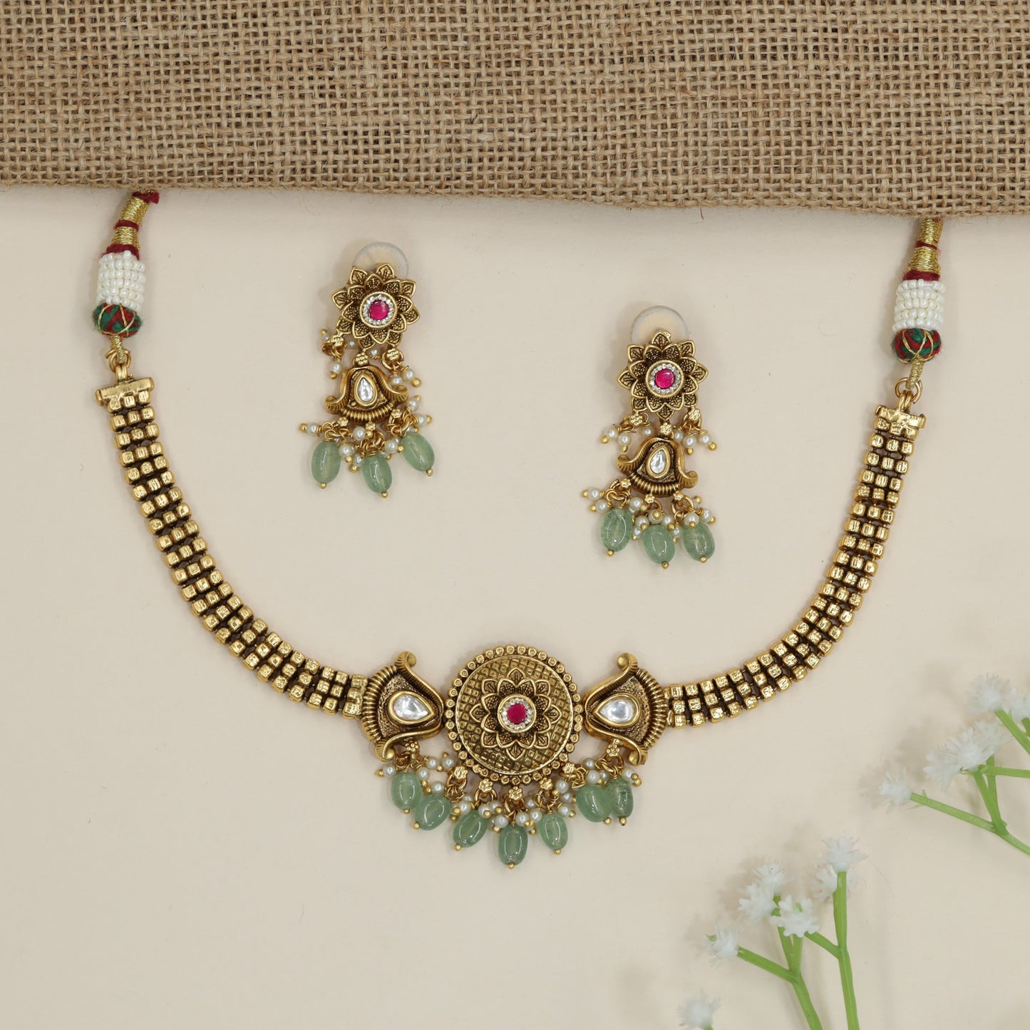 Heritage floral statement necklace with ornamental border accents