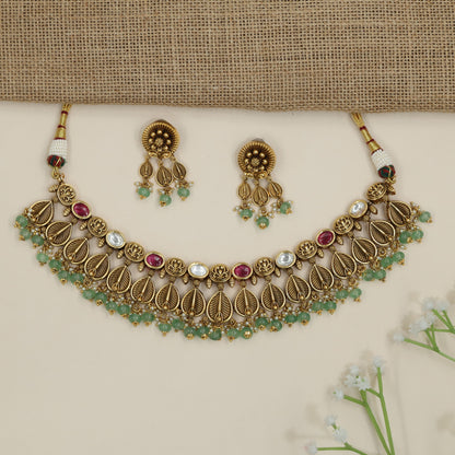 Traditional leaf pattern choker with layered botanical silhouette
