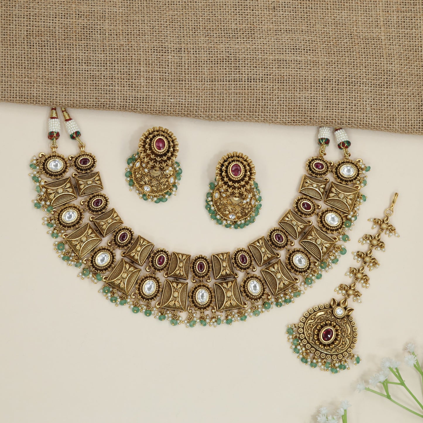 Heritage ornamental choker with engraved motifs and decorative fringe