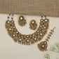 Heritage ornamental choker with engraved motifs and decorative fringe