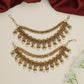 Curved horn motif Antique Mati with ornamental fringe accents
