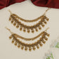 Curved horn motif Antique Mati with ornamental fringe accents