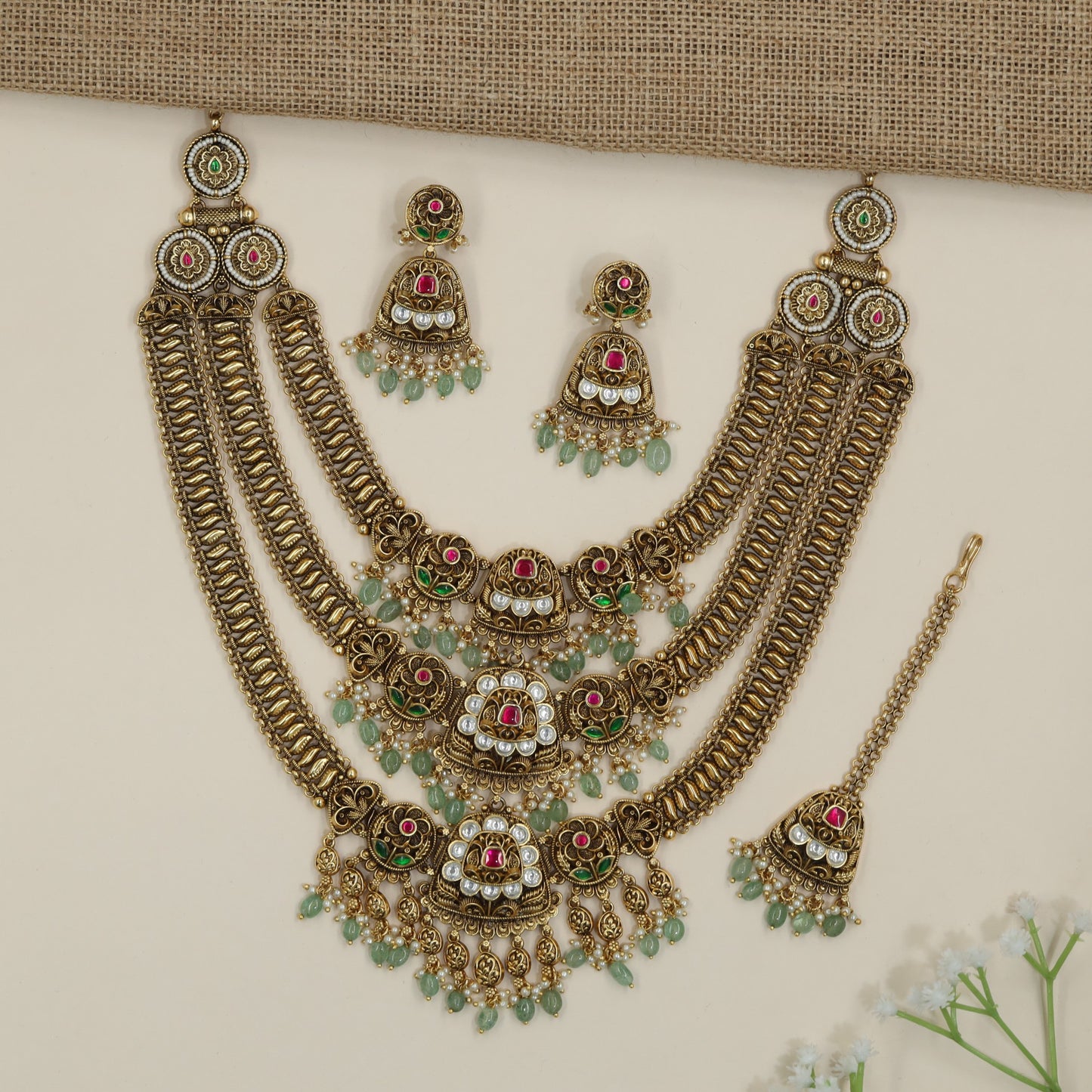 Multi-Layer Antique Long Haara with Jhumka Centrepieces and Green Bead Fringe