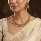 Regal Antique Necklace with Cascading Pearl Cluster Border