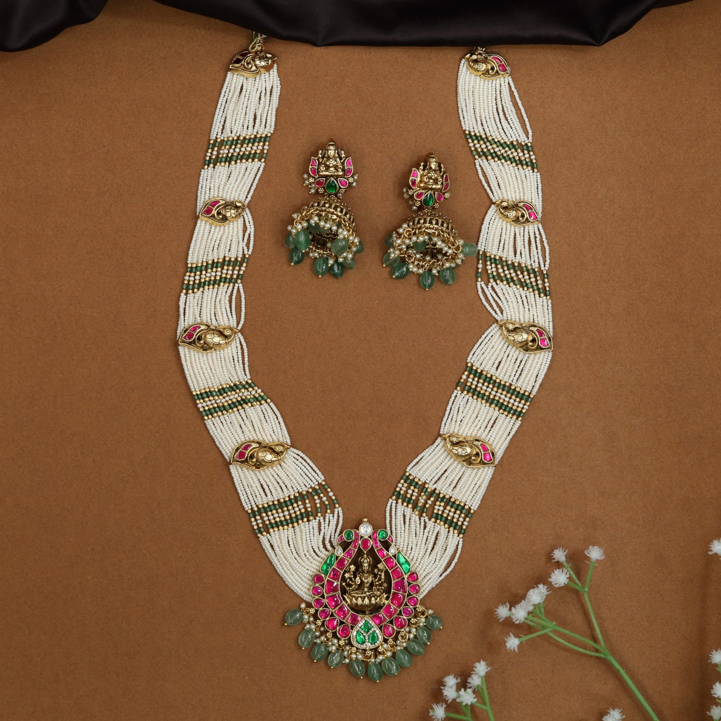 Heritage Lakshmi long haara with multi-row pearl strands and gemstone accents