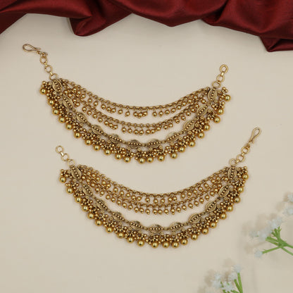 Festive Antique Mati Incorporating Articulated Metal Sections and Delicate Links