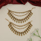 Sculpted peacock Antique Mati with decorative fringe silhouette