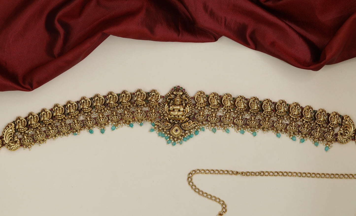 Designer Antique Waist Belt featuring Lakshmi motifs and decorative bead drops
