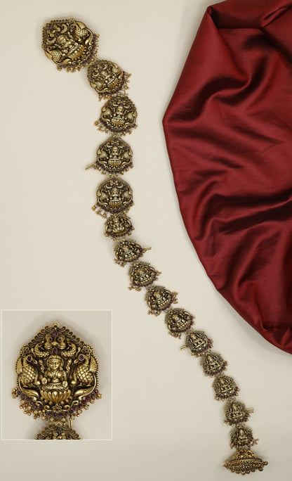 Classic Lakshmi long jade featuring peacock motifs and heritage-inspired artistry