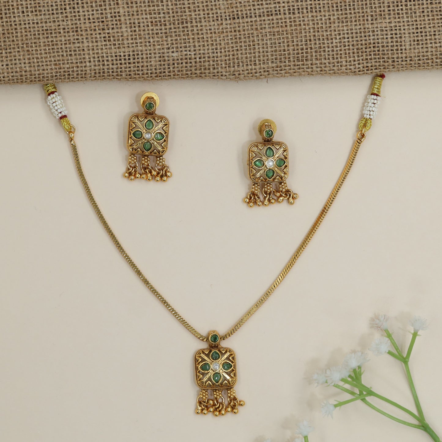 Signature Kundan Necklace Incorporating Uniform Textured Backing and Drop Accents