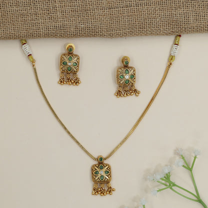 Signature Kundan Necklace Incorporating Uniform Textured Backing and Drop Accents