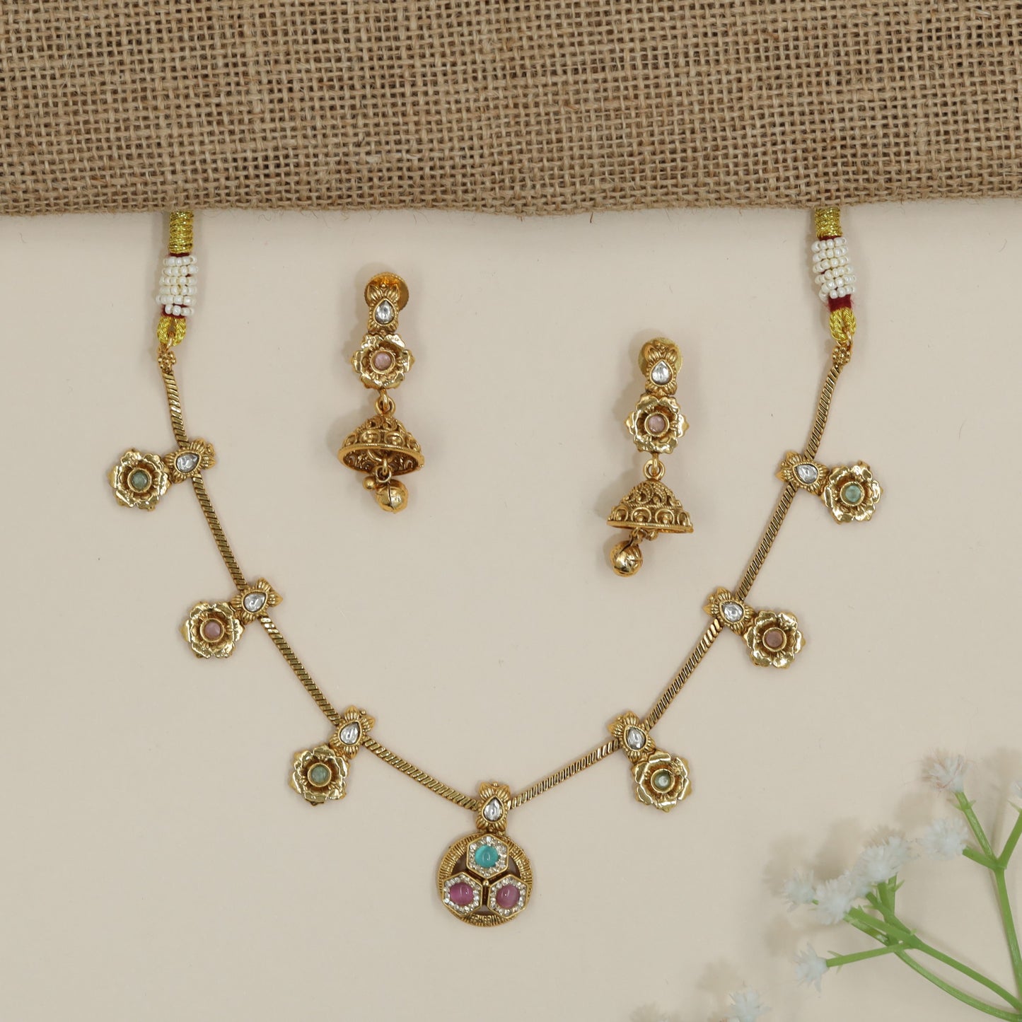 Prestige Kundan Necklace Finished with Raised Circular Rims and Bell Drops