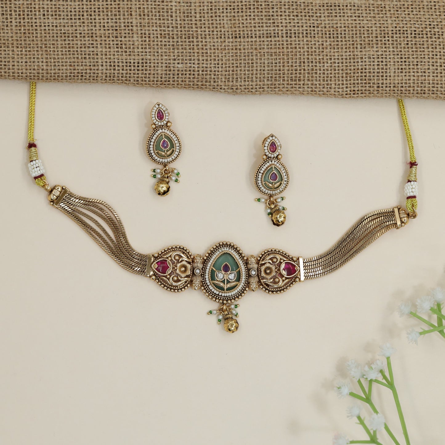 Oval Medallion Kundan Necklace with Multi-Strand Chain Design