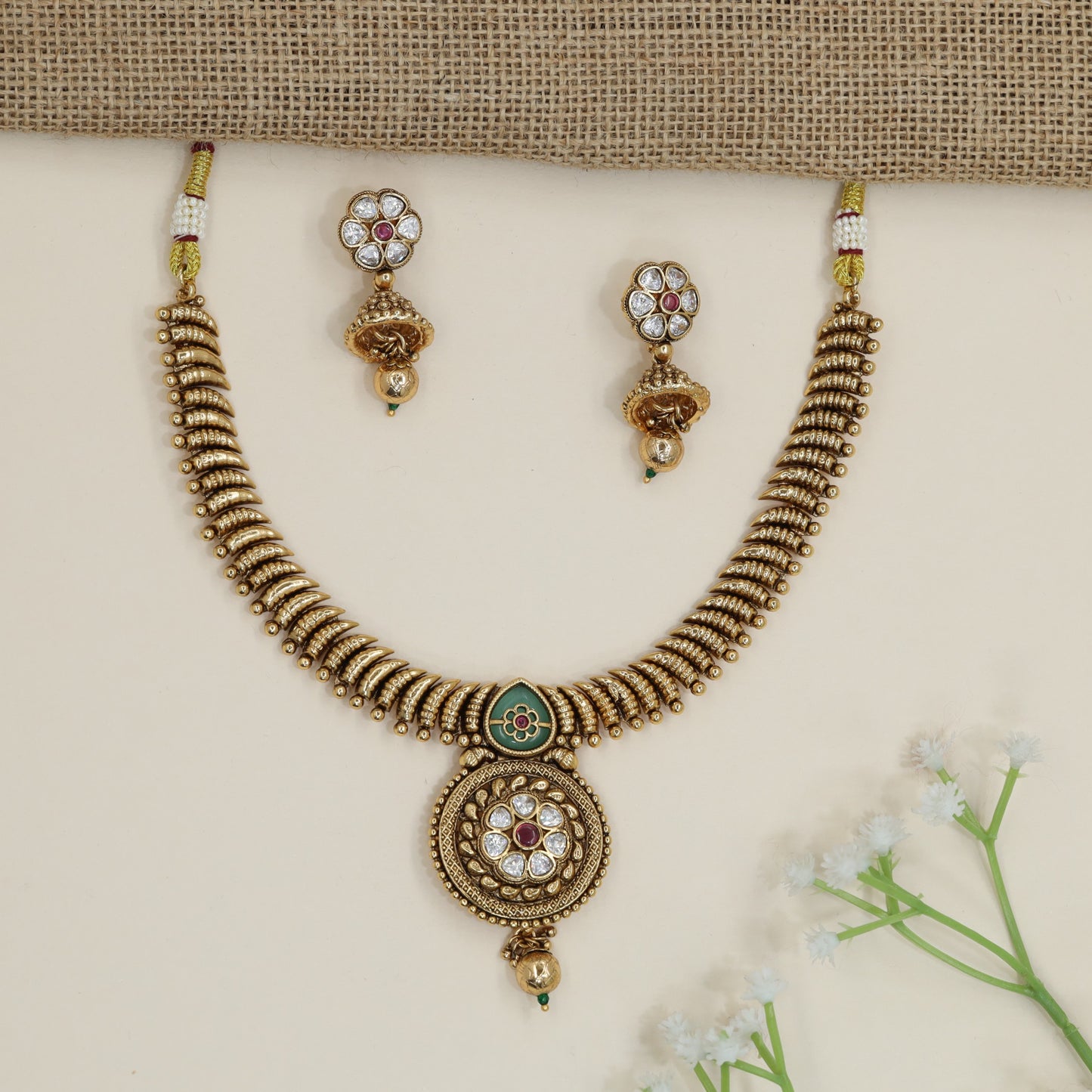 Ribbed Pattern Necklace with Floral Rosette Medallion Pendant